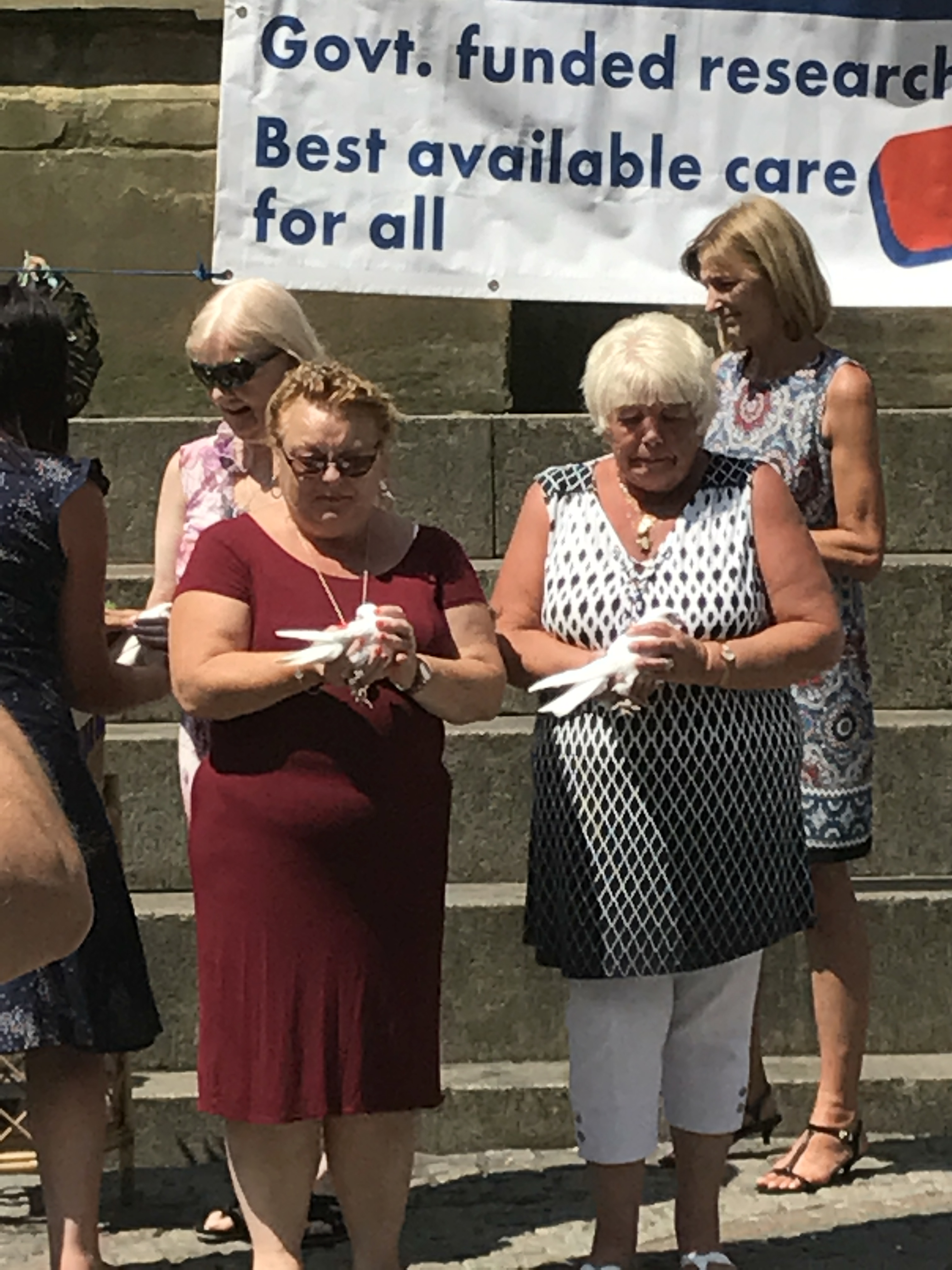 2 women with Doves on Action Mesothelioma Day 2018